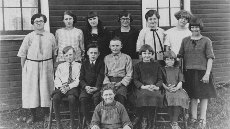 Photograph of school children with their teacher.